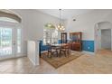 Formal dining room with wooden table and chairs at 7518 Paspalum, Punta Gorda, FL 33955