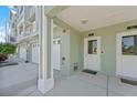 White door entryway with access to garages and the building at 10390 Longshore # 83, Placida, FL 33946