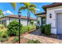 Brick walkway leading to the home's front entrance at 17649 Northwood Pl, Bradenton, FL 34202