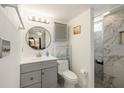 Clean bathroom with vanity, toilet, and a walk-in shower at 2711 Larkspur Dr, Punta Gorda, FL 33950