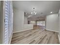 Bright dining room with wood-look floors and large windows at 2914 112Th E Ter, Parrish, FL 34219