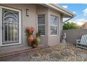 Front entry with decorative planters and stone pathway at 3491 Byron Ln, Longboat Key, FL 34228