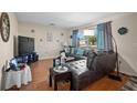 Spacious living room featuring a sectional sofa and hardwood floors at 3503 18Th W Ave, Bradenton, FL 34205