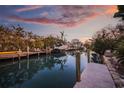 Private dock and canal access with boats in view at 550 De Narvaez Dr, Longboat Key, FL 34228