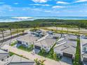 Aerial view of four homes near the water at 6039 Salt Grass St, Bradenton, FL 34210