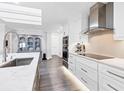 Modern kitchen with stainless steel appliances and marble countertops at 3611 99Th W St, Bradenton, FL 34210