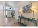 Bright foyer featuring soaring ceilings, artwork, and natural light at 4018 38Th W St, Bradenton, FL 34205