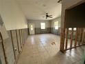 Under construction living room with tile floors at 690 Broadway St, Longboat Key, FL 34228