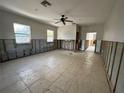Under construction living room with tile floors at 690 Broadway St, Longboat Key, FL 34228