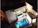 Elevated view of a modern home with a backyard pool and spa at 2110 Michele Dr, Sarasota, FL 34231