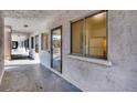 Exterior hallway with private entrances to the condo units at 3101 Bee Ridge Rd # 118, Sarasota, FL 34239