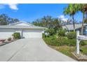 Well-maintained home with a manicured front lawn and a double-car garage at 3622 Bonaventure Ct, Sarasota, FL 34243