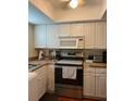 Cozy kitchen with wood countertops and stainless steel appliances at 6067 Arlene Way, Bradenton, FL 34207