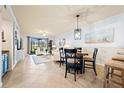 Bright dining area with view to living room at 7149 River Hammock Dr # 101, Bradenton, FL 34212