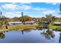 A home situated on a lot with water views from the backyard at 3718 61St St, Bradenton, FL 34209