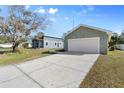 Newly built home with a two-car garage and spacious driveway at 3711 20Th E St, Bradenton, FL 34208