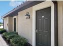 Private condo entrance with landscaping at 5721 Palmer Cir # 205, Lakewood Ranch, FL 34211