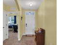 Bright entryway with tile flooring and view of office at 431 Gris Sky Ln, Bradenton, FL 34212