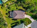 Aerial view of house showing pool, landscaping, backyard, and outdoor space at 779 Fordingbridge Way, Osprey, FL 34229