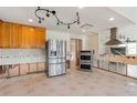 Kitchen with stainless steel appliances and ample counter space, ready for customization at 951 Contento St., Siesta Key, FL 34242