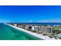 Stunning beachfront condos offer direct access to white sand beaches and turquoise waters at 435 L Ambiance Dr # L807, Longboat Key, FL 34228