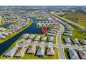 Aerial view showing home location in a community with lake access at 5429 Mystic Water Cv, Bradenton, FL 34211