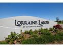 Community entrance sign for Lorraine Lakes at Lakewood Ranch at 5429 Mystic Water Cv, Bradenton, FL 34211
