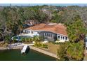 Beautiful pool home on canal with easy ocean access and dock with boat lift at 1240 Northport Dr, Sarasota, FL 34242