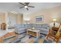 Inviting living room with hardwood floors, stylish furnishings, and plenty of natural light at 4411 Violet Ave, Sarasota, FL 34233