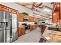 Well-equipped kitchen featuring granite countertops, stainless steel appliances, and ample cabinet space at 5036 Willow Leaf Way, Sarasota, FL 34241