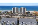 Aerial shot of beachfront high-rise condos with ample parking and easy beach access at 900 Gulf Blvd # 805, Indian Rocks Beach, FL 33785