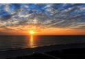 Spectacular sunset over the ocean view from the beach at 1105 Gulf Of Mexico Dr # 603, Longboat Key, FL 34228