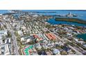 Stunning aerial view showcasing the property's location near bay and surrounding neighborhood at 132 Harrison Dr, Sarasota, FL 34236