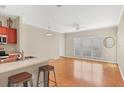 Bright, open living space with hardwood floors, neutral paint, and lots of natural light at 210 3Rd W St # 8204, Bradenton, FL 34205
