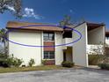 Cream-colored two-story condo building at 6071 Fairway Ln # 1424, Bradenton, FL 34210