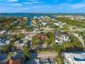 Stunning aerial view of a coastal neighborhood with a home circled at 6537 Gulf Of Mexico Dr, Longboat Key, FL 34228