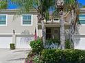 Charming two-story condo with a two-car garage and manicured landscaping at 6726 Fairview Ter # 6726, Bradenton, FL 34203