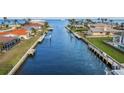 A view of a canal lined with waterfront homes, showcasing the serene boating community at 23 Ocean Dr, Punta Gorda, FL 33950