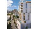 Modern high-rise with pool deck, showcasing elegant architecture and prime downtown location at 1703 Main St # Ph 3, Sarasota, FL 34236