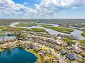 Beautiful aerial view of a home in a waterside community near a lake at 4809 11Th Avenue E Cir, Bradenton, FL 34208