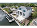 Stunning waterfront property featuring a private dock and a pool under construction at 927 Contento St, Sarasota, FL 34242