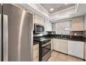 Well-equipped kitchen featuring stainless appliances, granite counters, and ample storage at 4608 Park Acres Dr, Bradenton, FL 34207