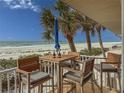 This cozy balcony offers a table and chairs and breathtaking ocean views from your private balcony at 6701 Gulf Of Mexico Dr # 311, Longboat Key, FL 34228