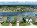 Residential community with water views, well maintained lawns and varied home styles at 9828 58Th E St, Parrish, FL 34219