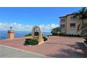Community entrance with waterfront views at 1 Colony Point Dr # 5C, Punta Gorda, FL 33950