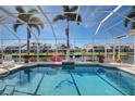 Relaxing screened-in pool overlooking the canal at 1429 Blue Jay Ct, Punta Gorda, FL 33950
