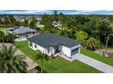 Property view showing house, landscaping, and neighborhood context at 280 Antis Dr, Rotonda West, FL 33947