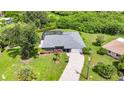 Aerial view of single-story home, paver driveway, and fenced pool at 269 Franca St, Punta Gorda, FL 33983