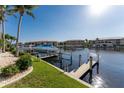 Private boat dock with covered slip and access to the waterway at 3311 Wood Thrush Dr # 126, Punta Gorda, FL 33950