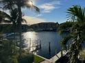 Stunning waterfront view with boats and dock at 3311 Wood Thrush Dr # 126, Punta Gorda, FL 33950